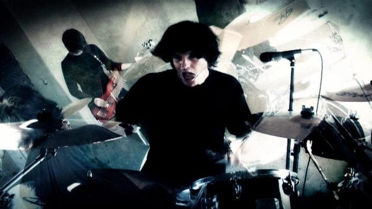 "One Mistake": Heavy Rock with Gospel Influences Collage of members of the band performing in the 'One mistake' music video by Zikedish