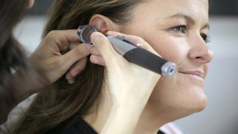 Innovative Training Videos for Eduplex Training Institute Otoscopic examination on a woman for ETI training videos